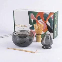 Matcha Kit Glass Set 5 Pcs with elegant transparent design, includes a glass bowl, bamboo whisk, bamboo scoop, and whisk holder Easy to use, beginner-friendly, and perfect for traditional matcha preparation Comes with a box